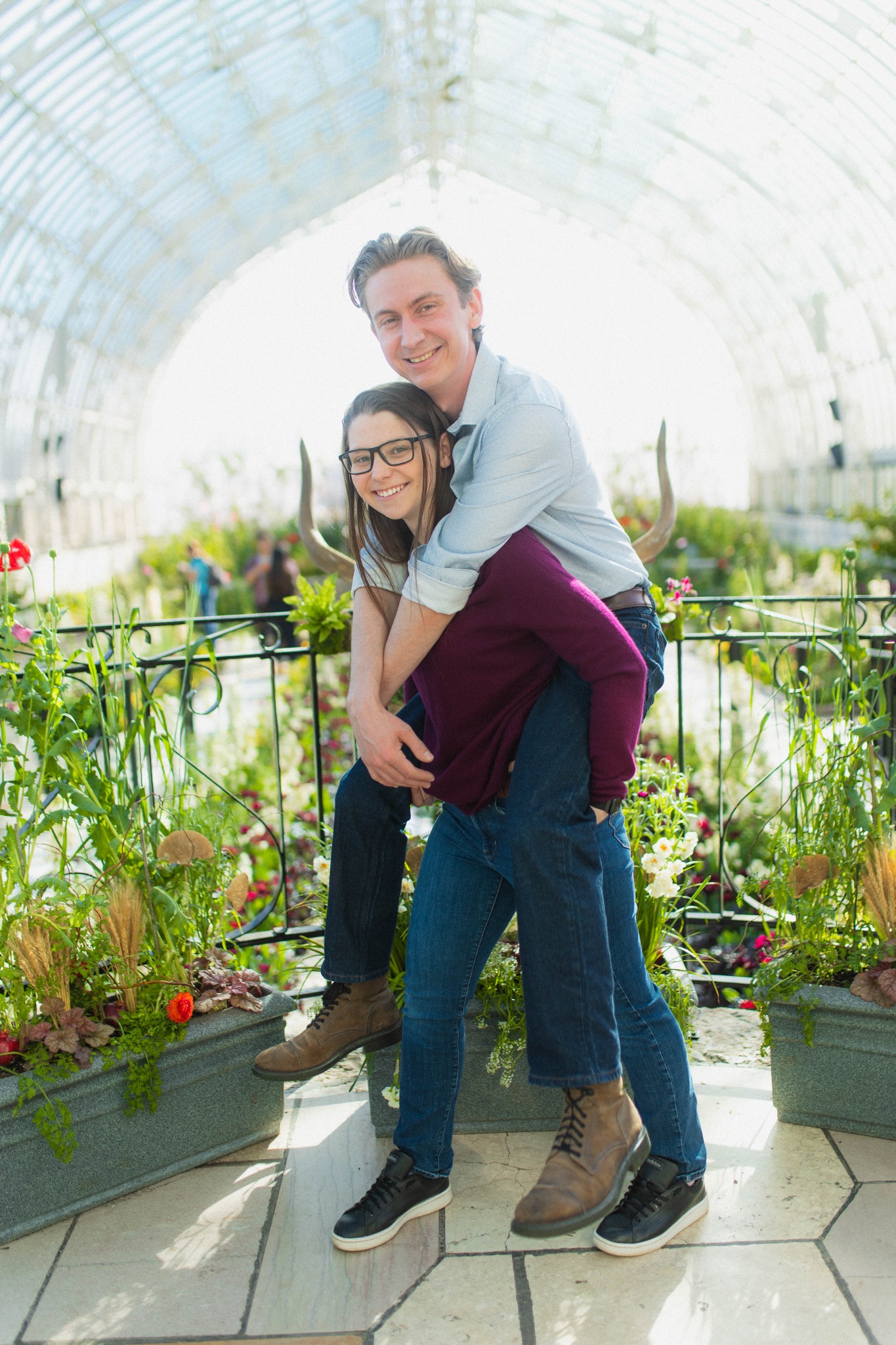 Rebecca on James's back smiling